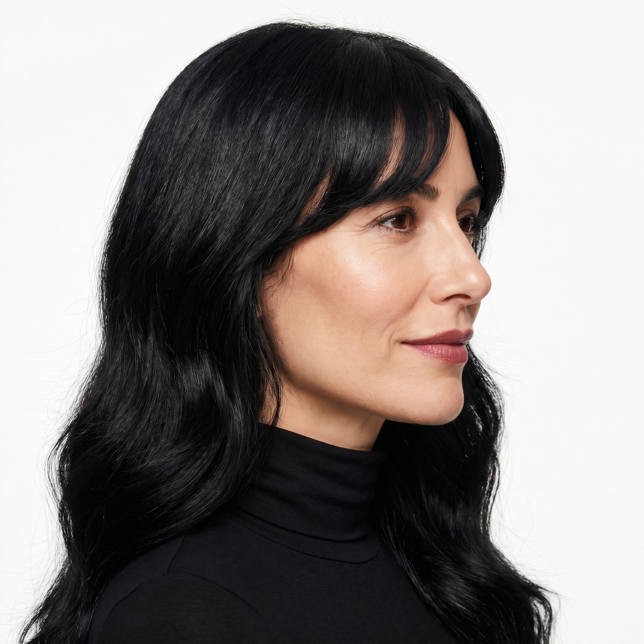 Clip-in curtain bangs in Black - side profile
